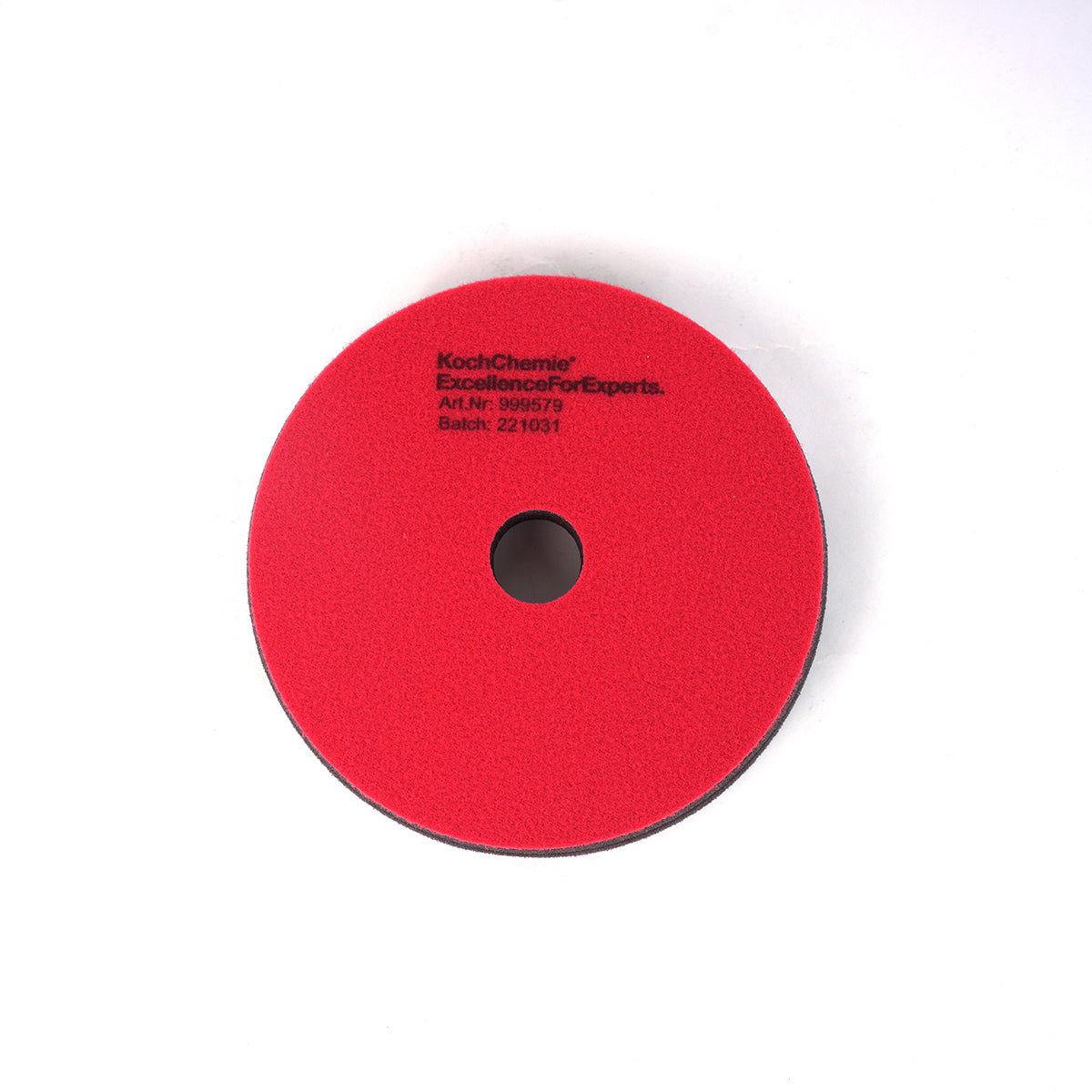 Red polishing pad with KochChemie branding on a white background