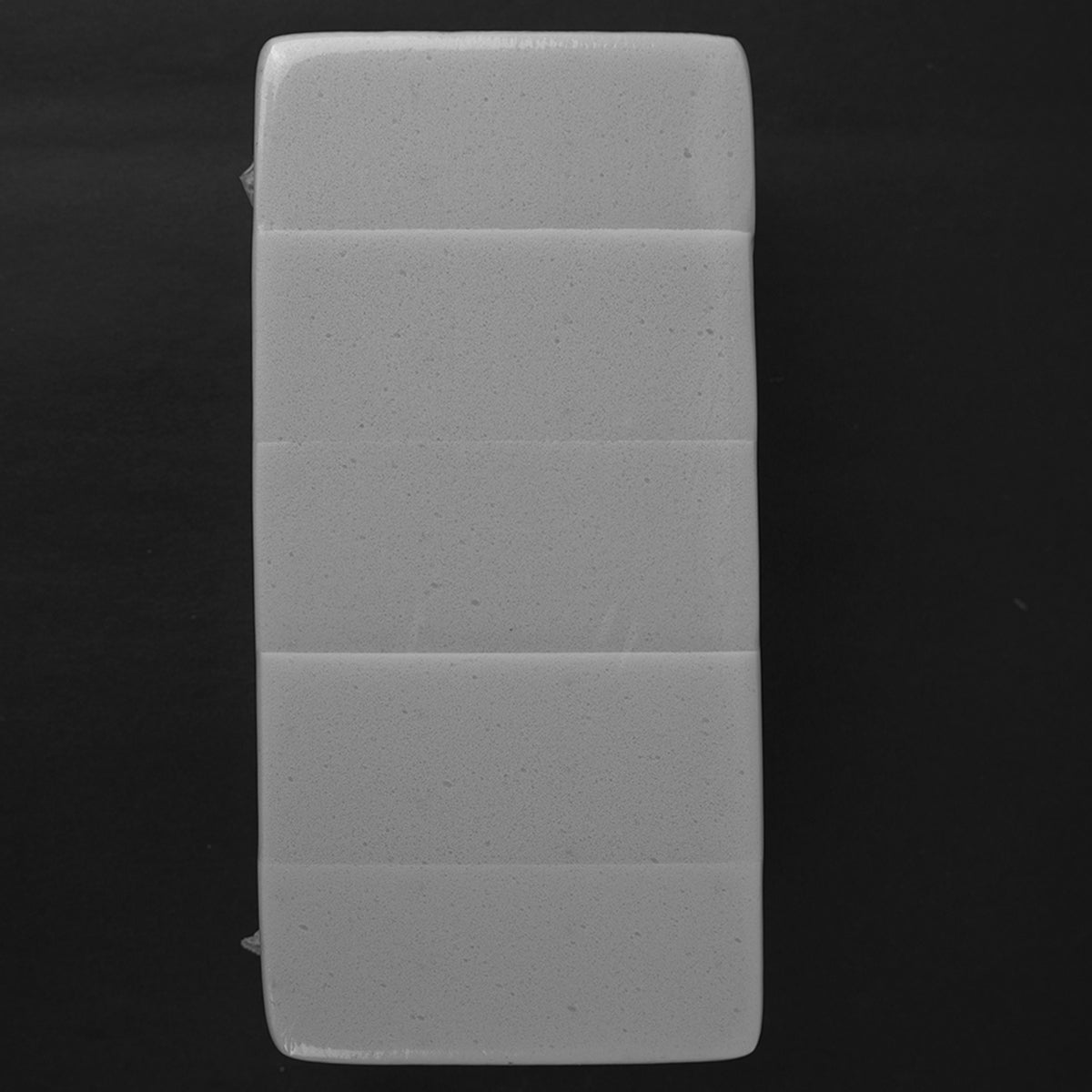 Rectangular gray stone on a black background