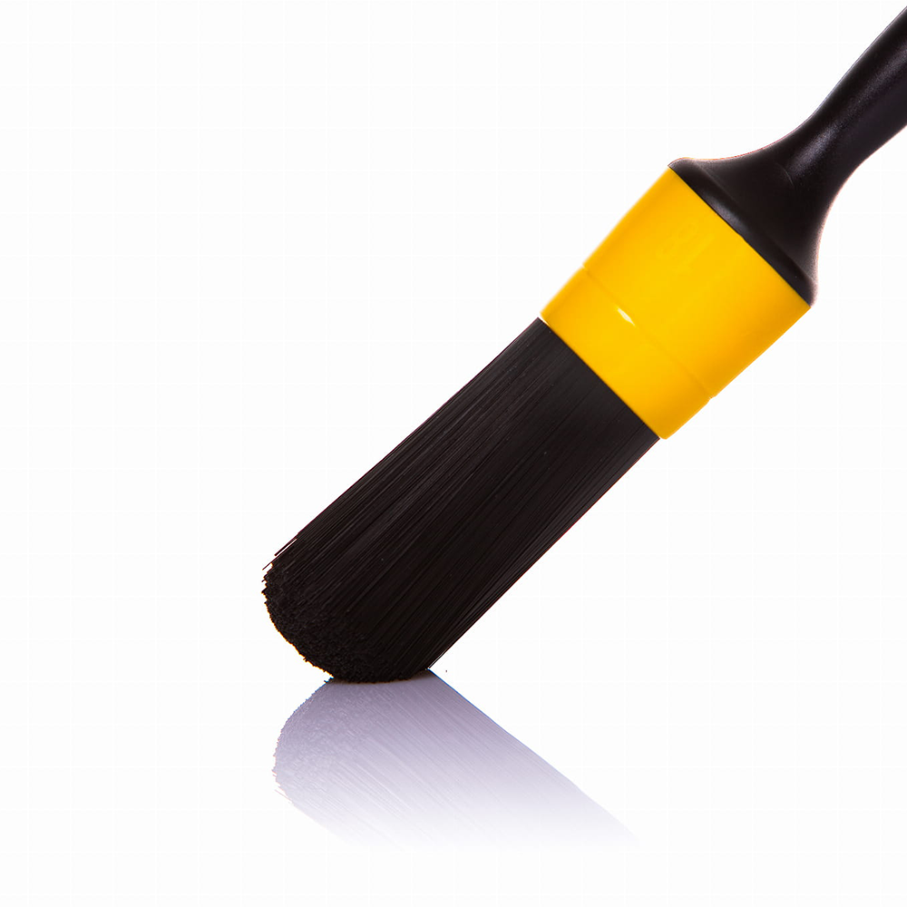 Black and yellow brush on a white background
