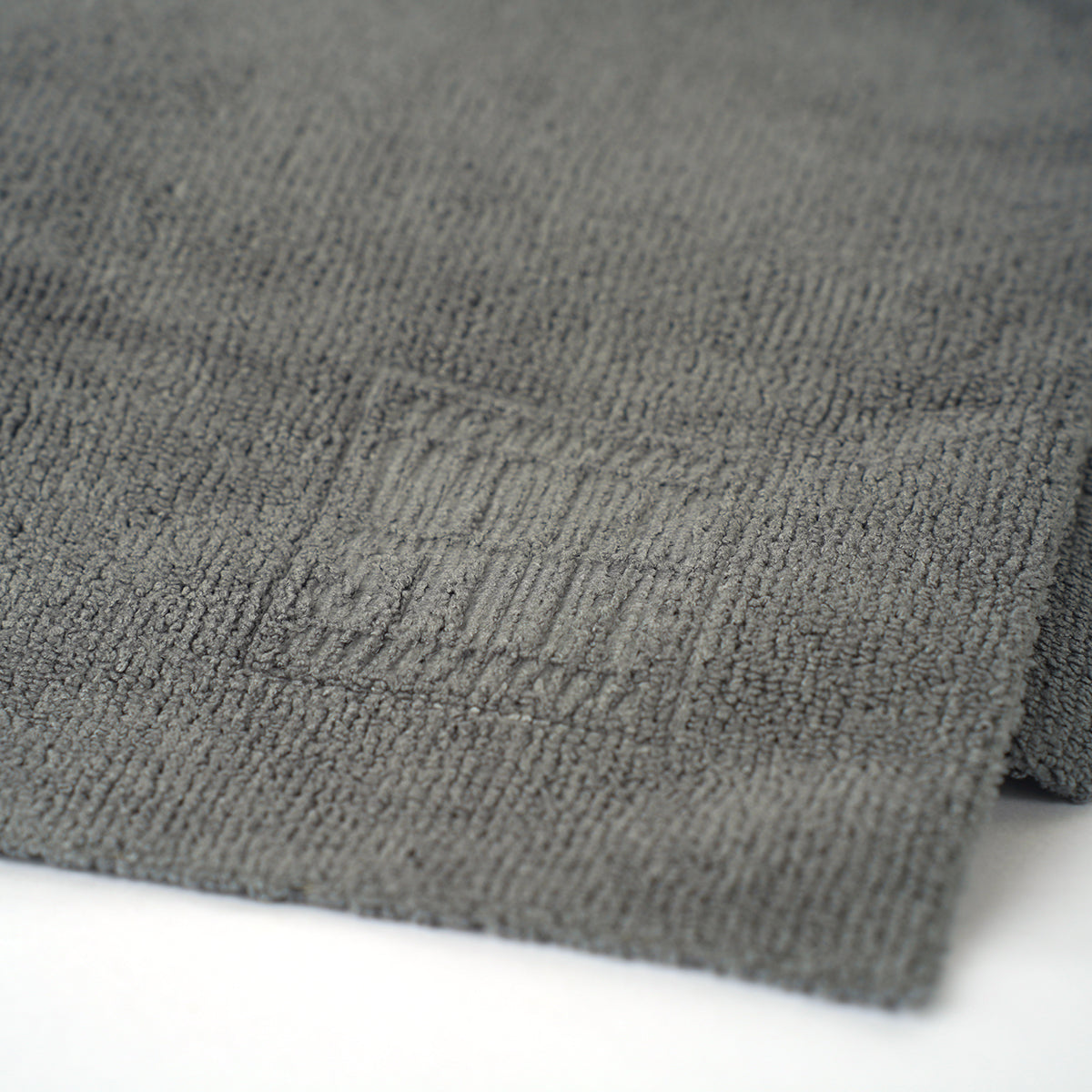 Gray textured fabric on a white background