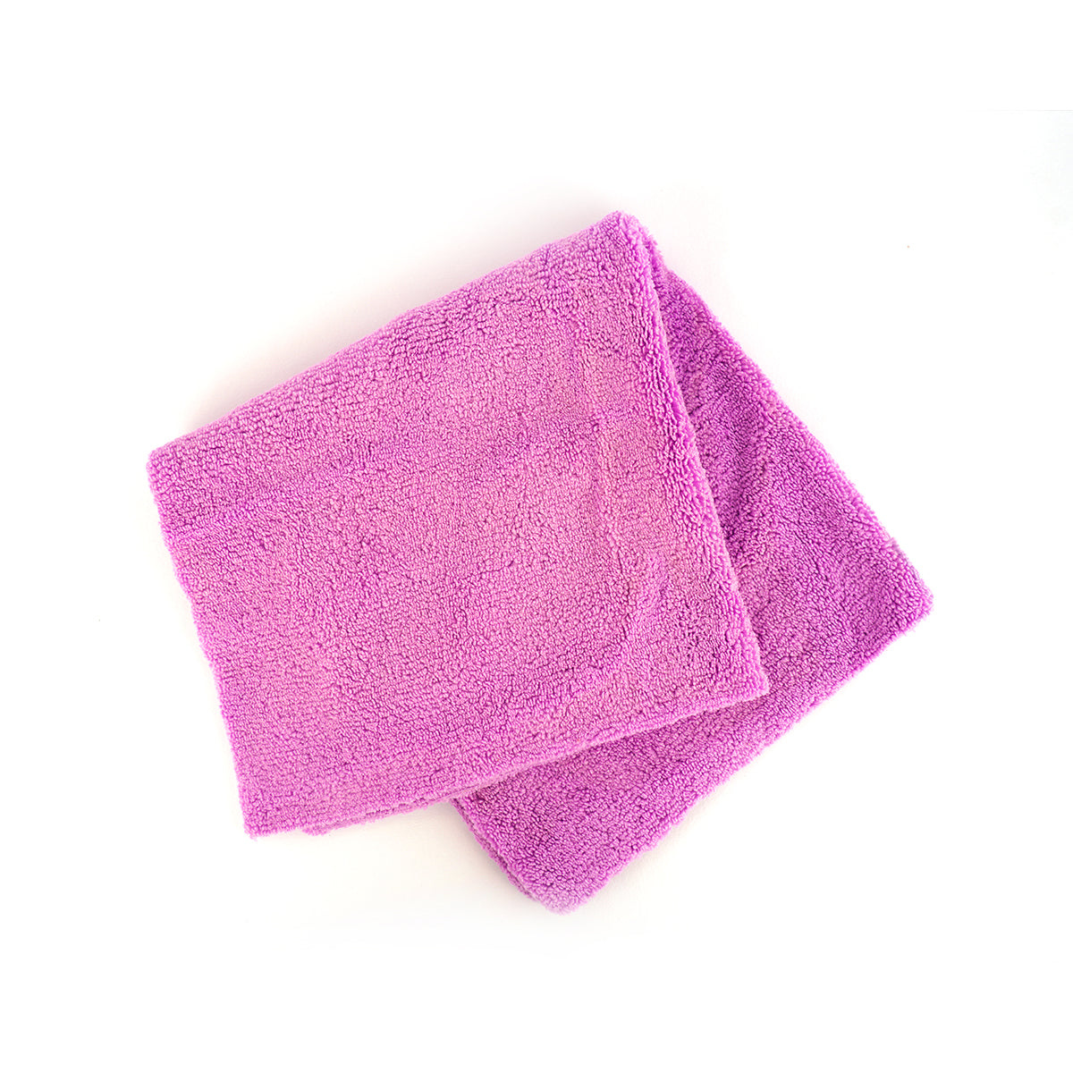 Two pink microfiber cloths on a white background