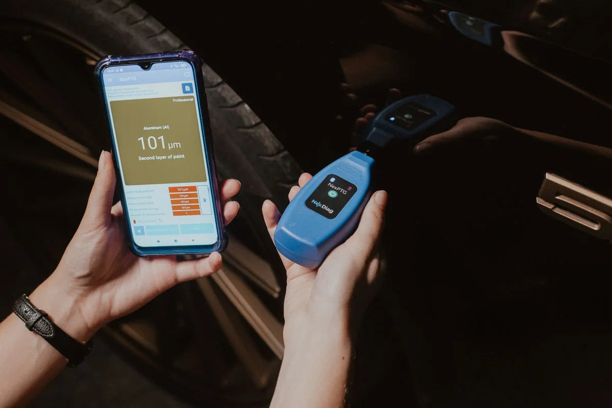 NexPTG Professional Paint Thickness Gauge in hand