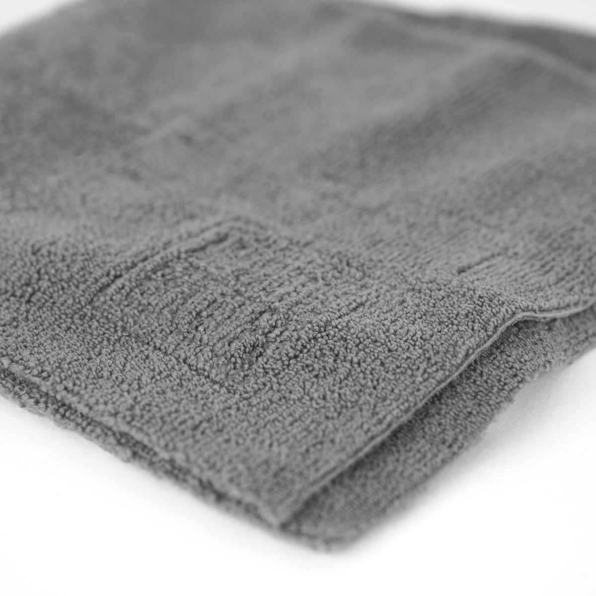 Gray towel on a white background