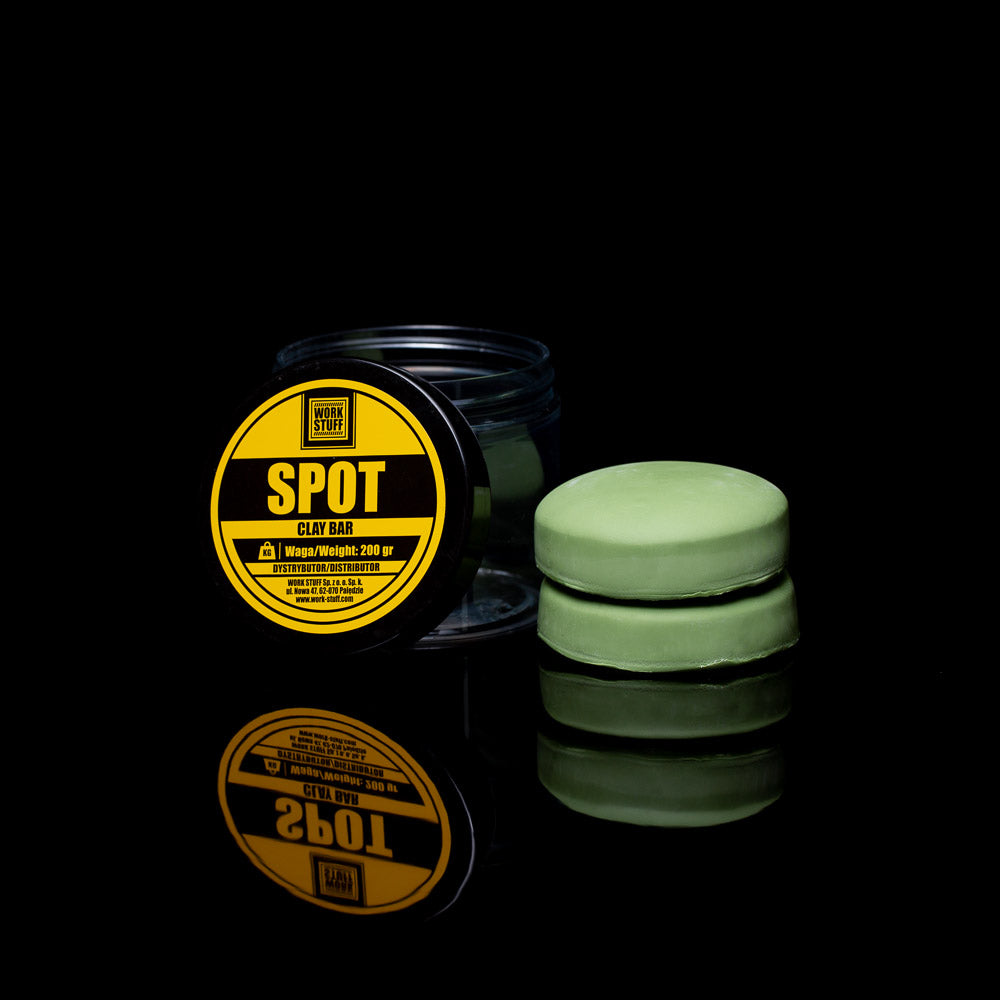 Green clay bar with a yellow label on a black background