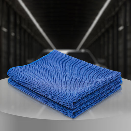 Koch Chemie Drying Towel 80x55 cm in blue with an absorbent waffle structure, ideal for streak-free drying of paint, glass, and plastic surfaces.