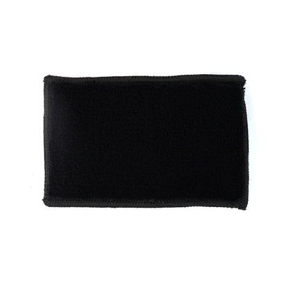 Black rectangular patch on a white background