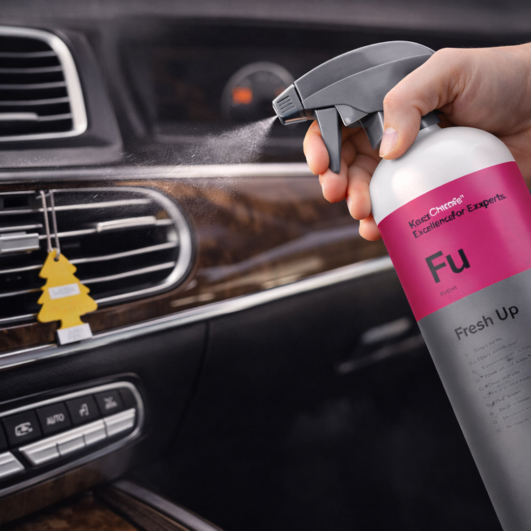 Koch Chemie Fresh Up 1Ltr Vehicle Air Fresheners spraying on car dashboard