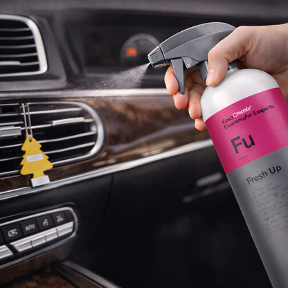 Koch Chemie Fresh Up 1Ltr Vehicle Air Fresheners spraying on car dashboard