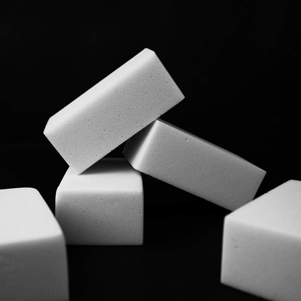 White rectangular blocks stacked on a black background