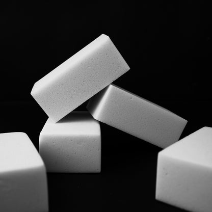 White rectangular blocks stacked on a black background