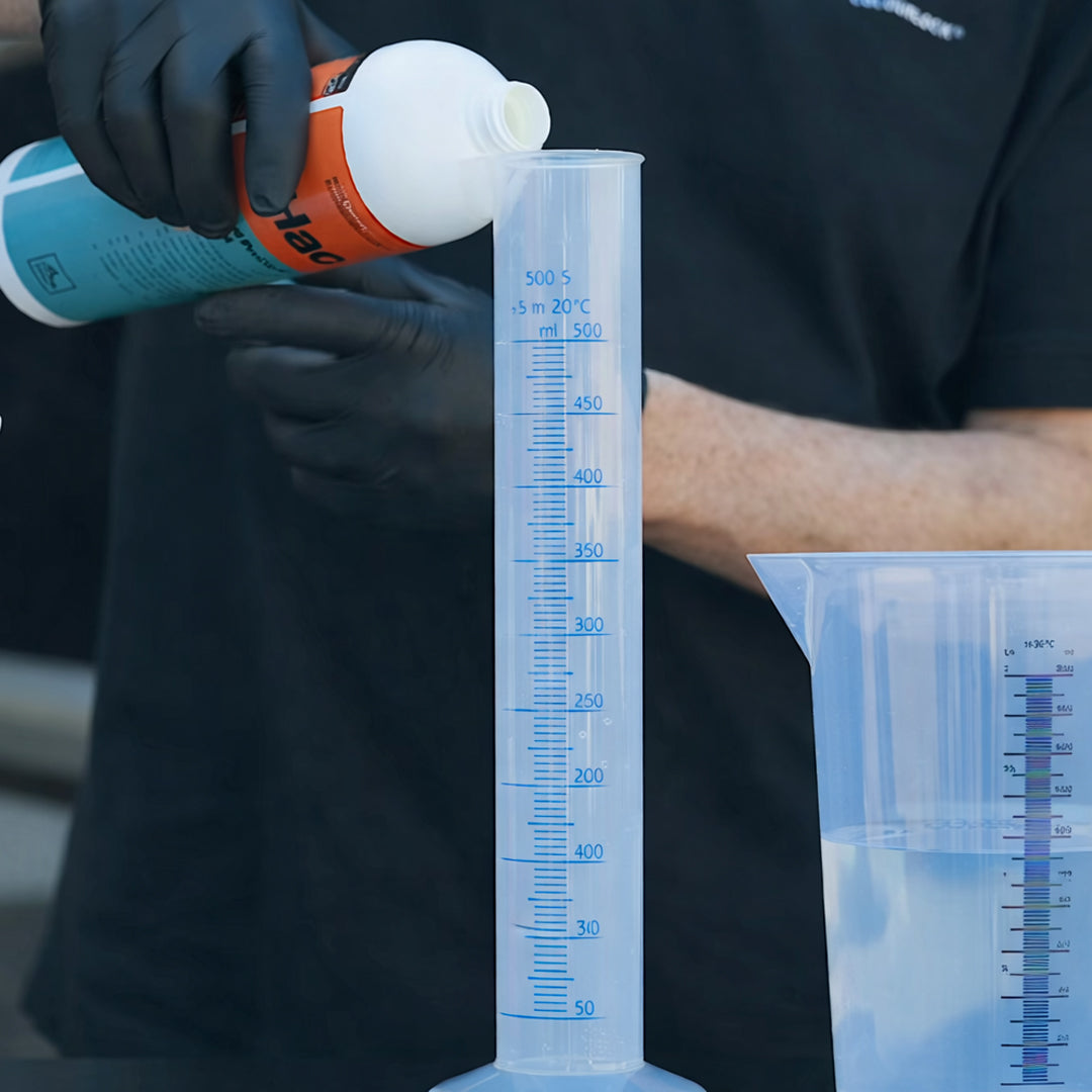 Koch Chemie Hull PreCleaner Acid Pre-Cleaner spill in funnel on black background