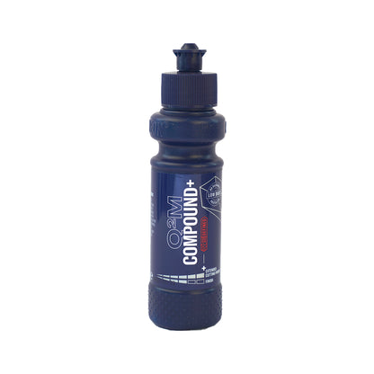 Blue bottle with black cap on a white background