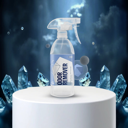 Spray bottle labeled with crystal-like structures on a dark background