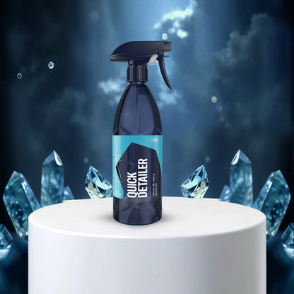 Quick Detailer' with crystal-like objects on a dark background