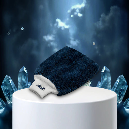 Blue scrubber on a white stand with crystal-like objects in the background