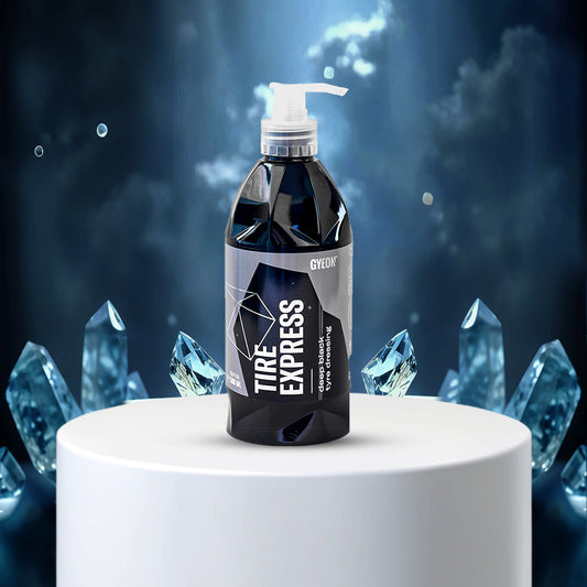 Bottle of Tire Express product on a white pedestal with crystal-like structures in the background