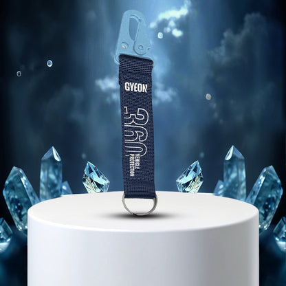Key Ring 360  Gyeon car strap with crystals on a dark background