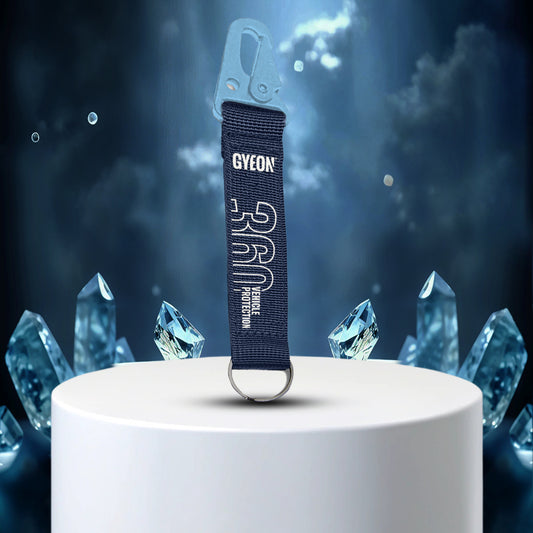 Key Ring 360  Gyeon car strap with crystals on a dark background