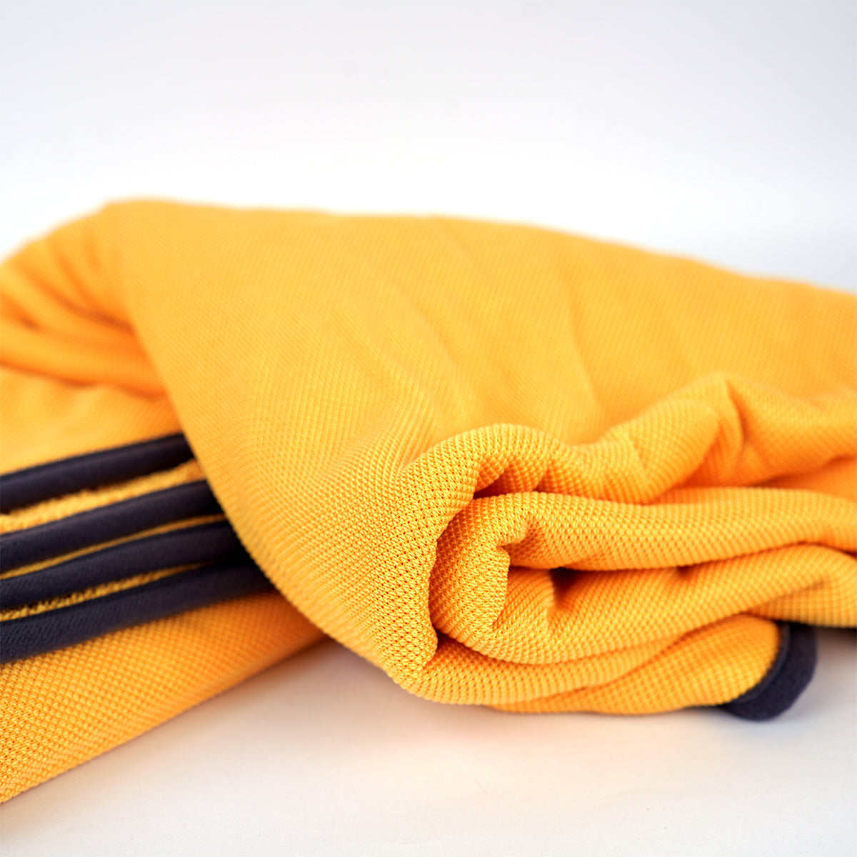 Yellow sports jacket with black stripes on a white background